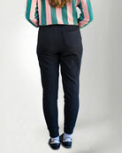 Black pants with the Palmr logo embroidery in jogger style