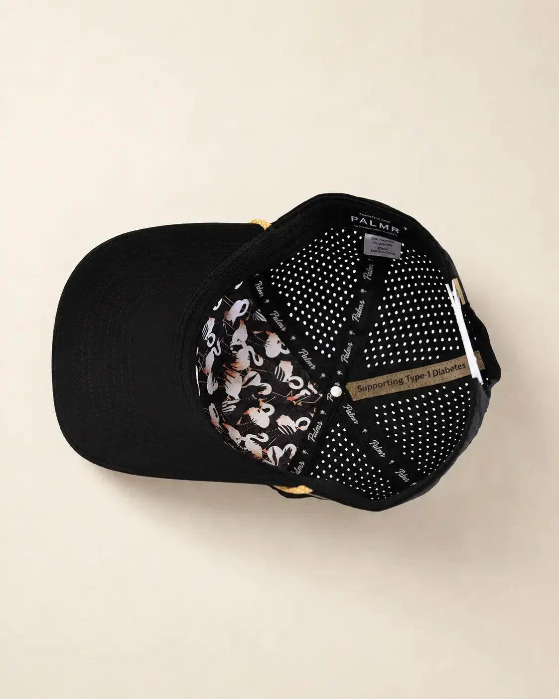 The 407 Signature Hat black and gold with Orlando area code and gold rope detailing