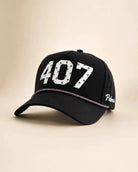 Black 407 Signature Hat with white Orlando area code and palm details on structured rope cap