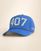 Blue 407 Hat with white silicone area code and palm design, water-resistant and breathable for lake days and boating