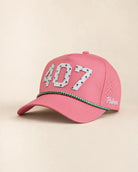 Pink 407 hat with Orlando area code and palm design, water-resistant and stylish for Florida heat