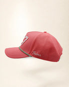The 727 Signature Hat (Pink), left side view: white Palmr script, perforated side panel, green and white rope, edge of the white 727.