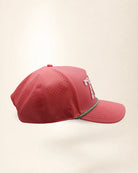 The 727 Signature Hat (Pink), right side view: perforated side panel, palm badge, green and white rope, edge of the white 727.