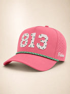The 813 Signature Hat in pink, a rope cap with '813' in raised white silicone lettering and 'Palmr' script on the side.