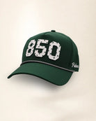 The 850 Signature Hat (Green): dark green rope snapback, white 850 with small green palm trees, black and white braided rope, perforated sides.