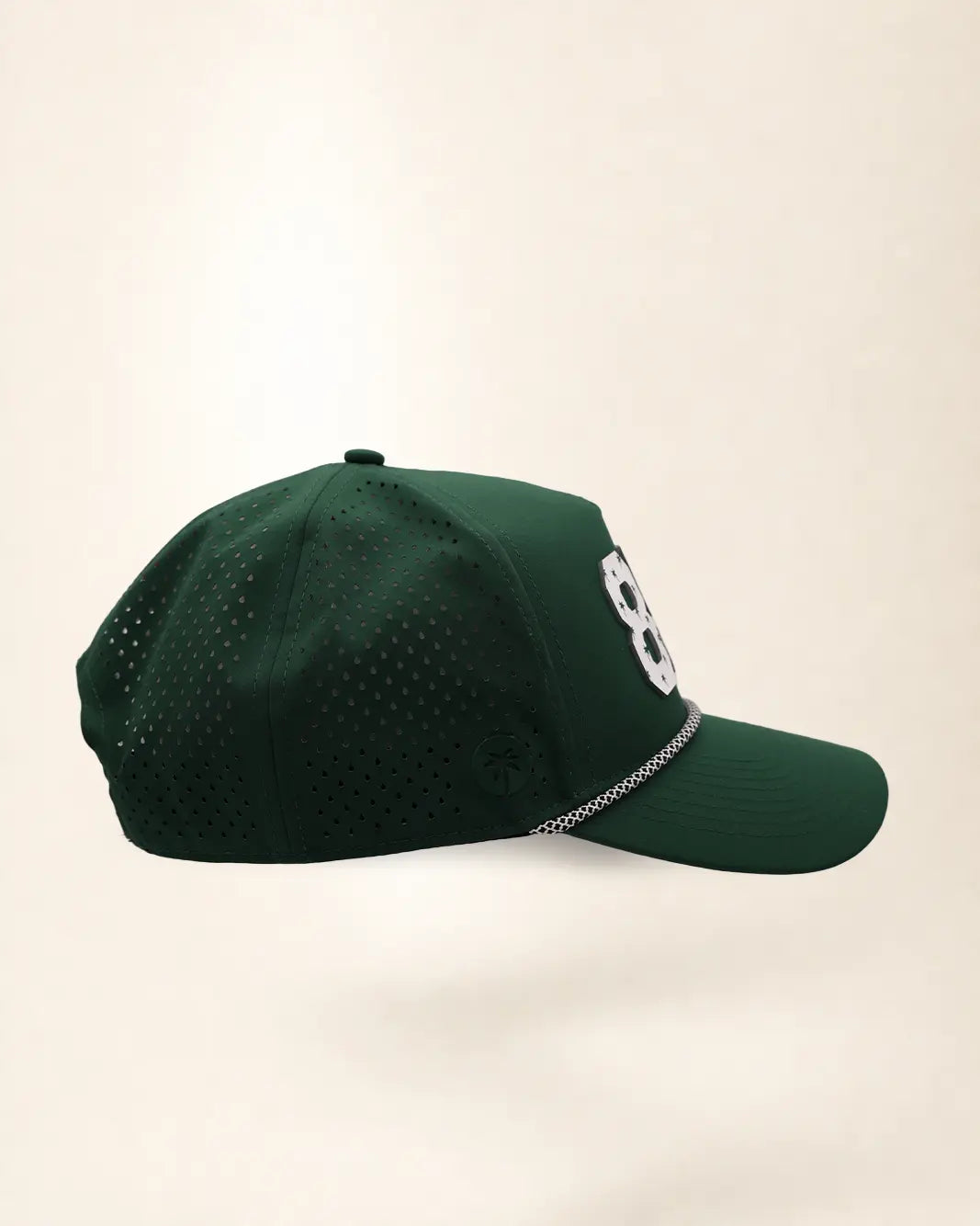 The 850 Signature Hat (Green): dark green rope snapback, white 850 with small green palm trees, black and white braided rope, perforated sides.