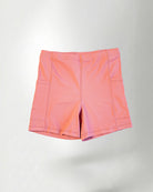 Pink short against white background 