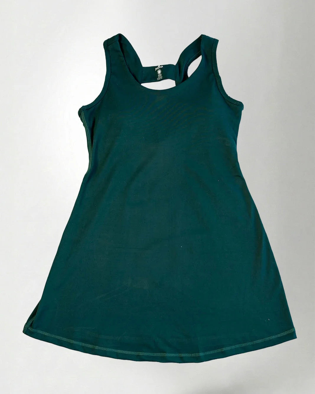 Green dress on a plain background