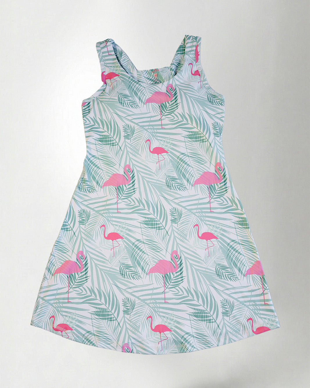 Tropical pattern dress against white background 