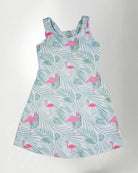 Tropical pattern dress against white background 