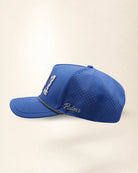 The 941 Signature Hat (Blue), left side view: white Palmr script, perforated side panel, black and white rope, edge of the white 941.