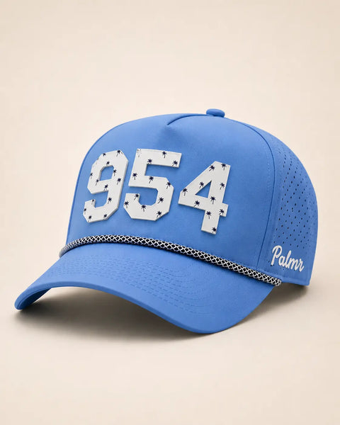 The 954 Signature Hat (Blue): blue rope snapback with 954 in white palm-print letters, navy and white rope, perforated sides, Palmr script.