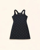Child wearing Ace Kids Dress in Palm Icon Night with mini palm print on dark charcoal fabric