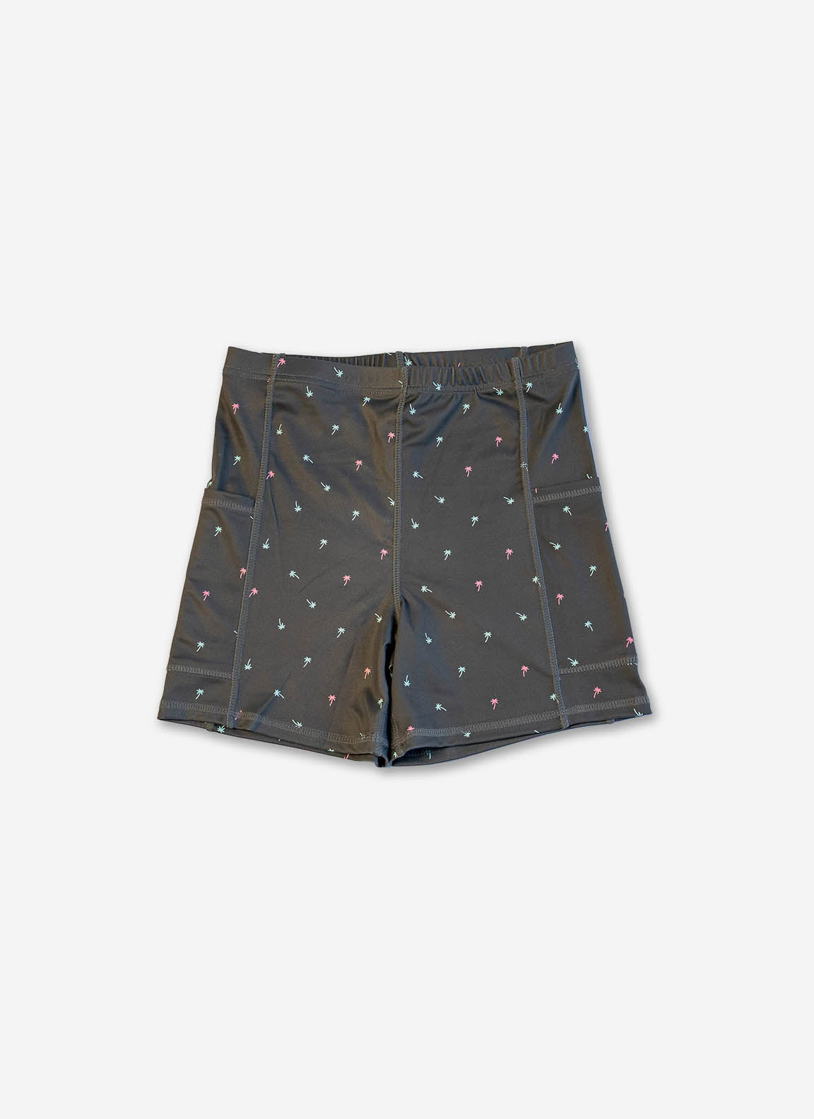 Black shorts with small white patterns on a light gray background