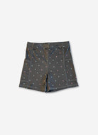 Black shorts with small white patterns on a light gray background