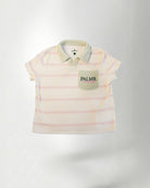 Striped polo shirt with a brand logo on a light gray background