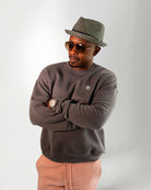 Person wearing a Palmr Style Cloud Embrace Crewneck Sweatshirt against a white background