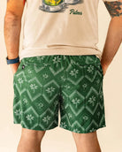 The Club Palm Hybrid Swim Shorts in Palm Green geometric diamond print with zippered pockets for versatile outdoor activities