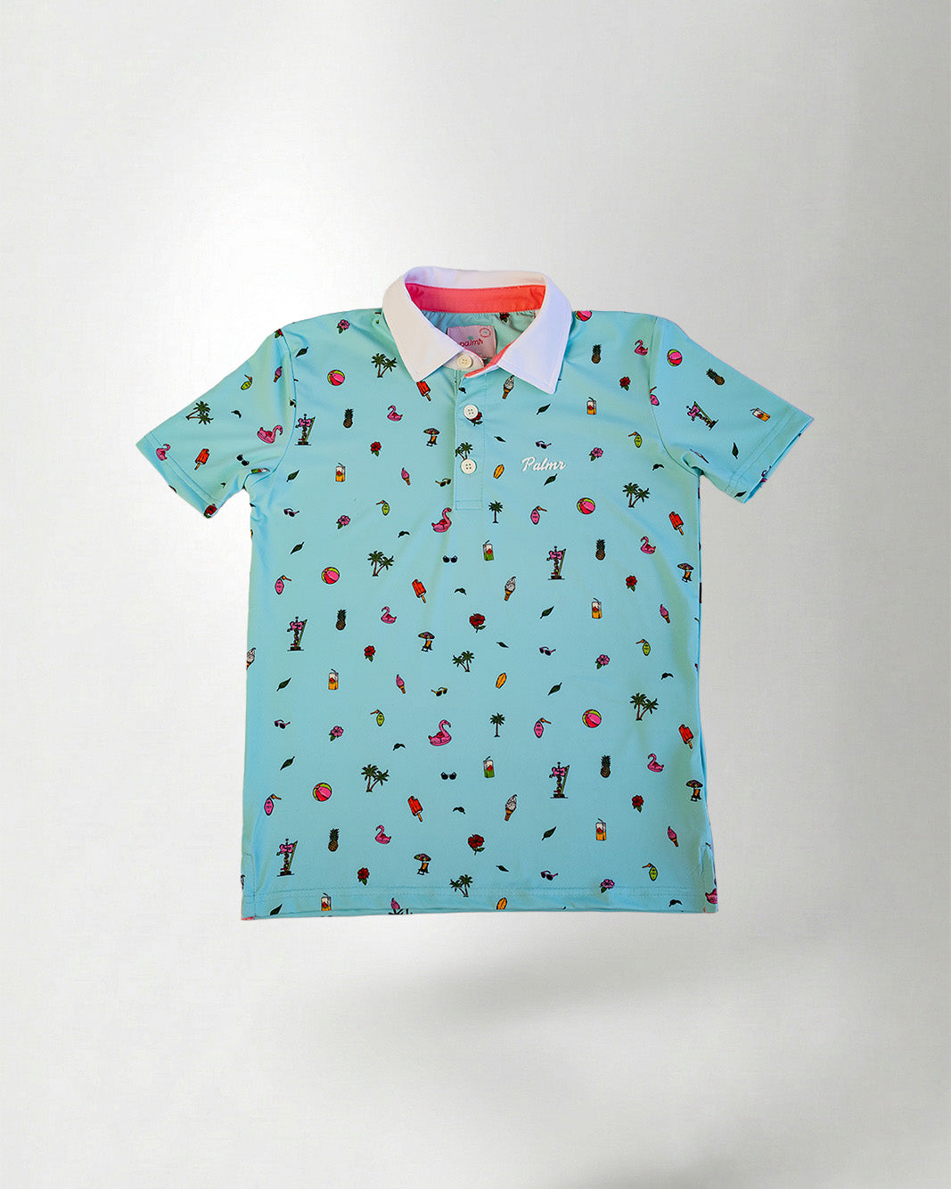 Light blue polo shirt with colorful patterns on a plain background