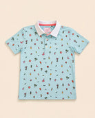 The Palmr Coastal Bay Kids Polo with teal base, white collar, and palm tree icons in athletic fit