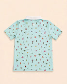 Kids wearing The Palmr Coastal Bay Kids Polo in teal with white collar and palm tree icons