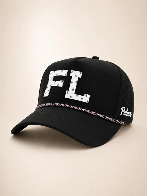 The FL Signature Hat (Black): black rope snapback, white FL with small green palm trees, pink and black braided rope, perforated sides.