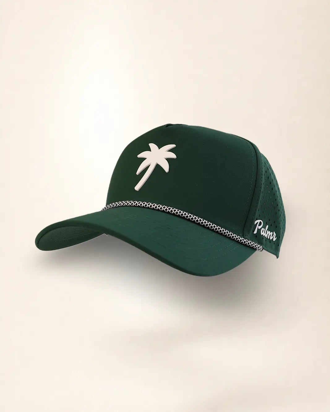 A dark green baseball cap with a white palm tree logo on the front, a silver chain detail across the brim, and 'Palmer' embroidered in white on the side, set against a plain off-white background.