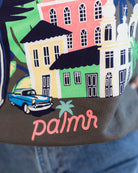 sweatshirt with a colorful parrot design on a plain background