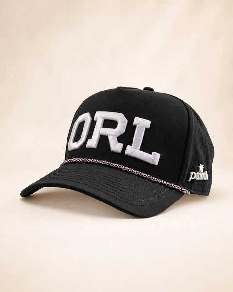 The ORL Hat - Classic: black rope snapback with ORL embroidered in white puff letters, thin pink rope, perforated sides, Palmr script logo.
