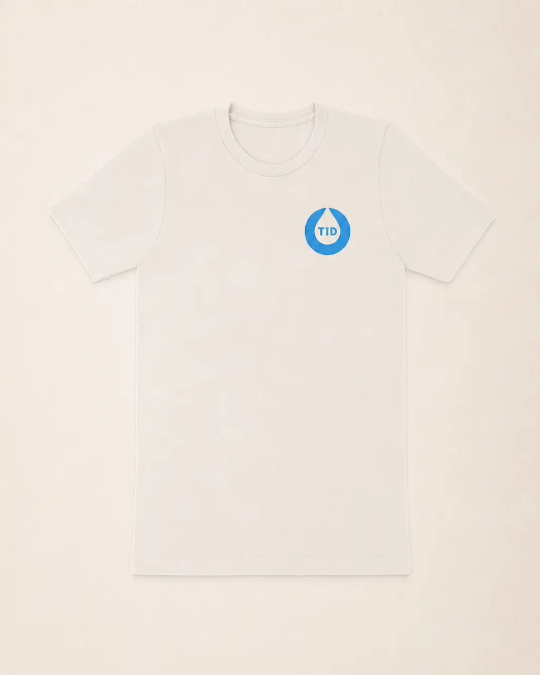 White t-shirt with a blue circular logo on a beige background