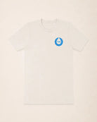 White t-shirt with a blue circular logo on a beige background