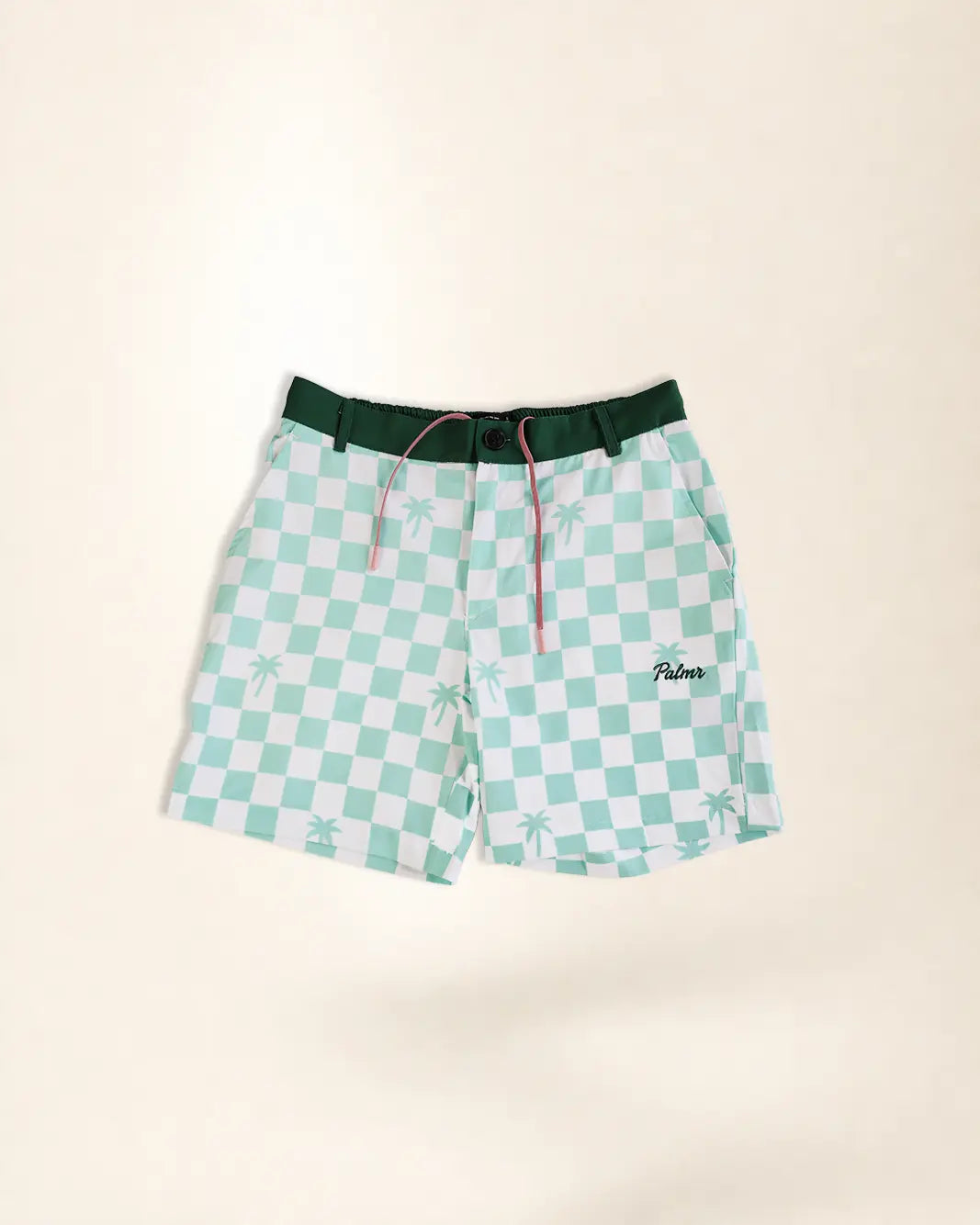 Palmrs men's board shorts featuring a mint green and white checkered pattern with palm tree motifs, a dark green elastic waistband, and a pink drawstring, shown flat on a light beige background.