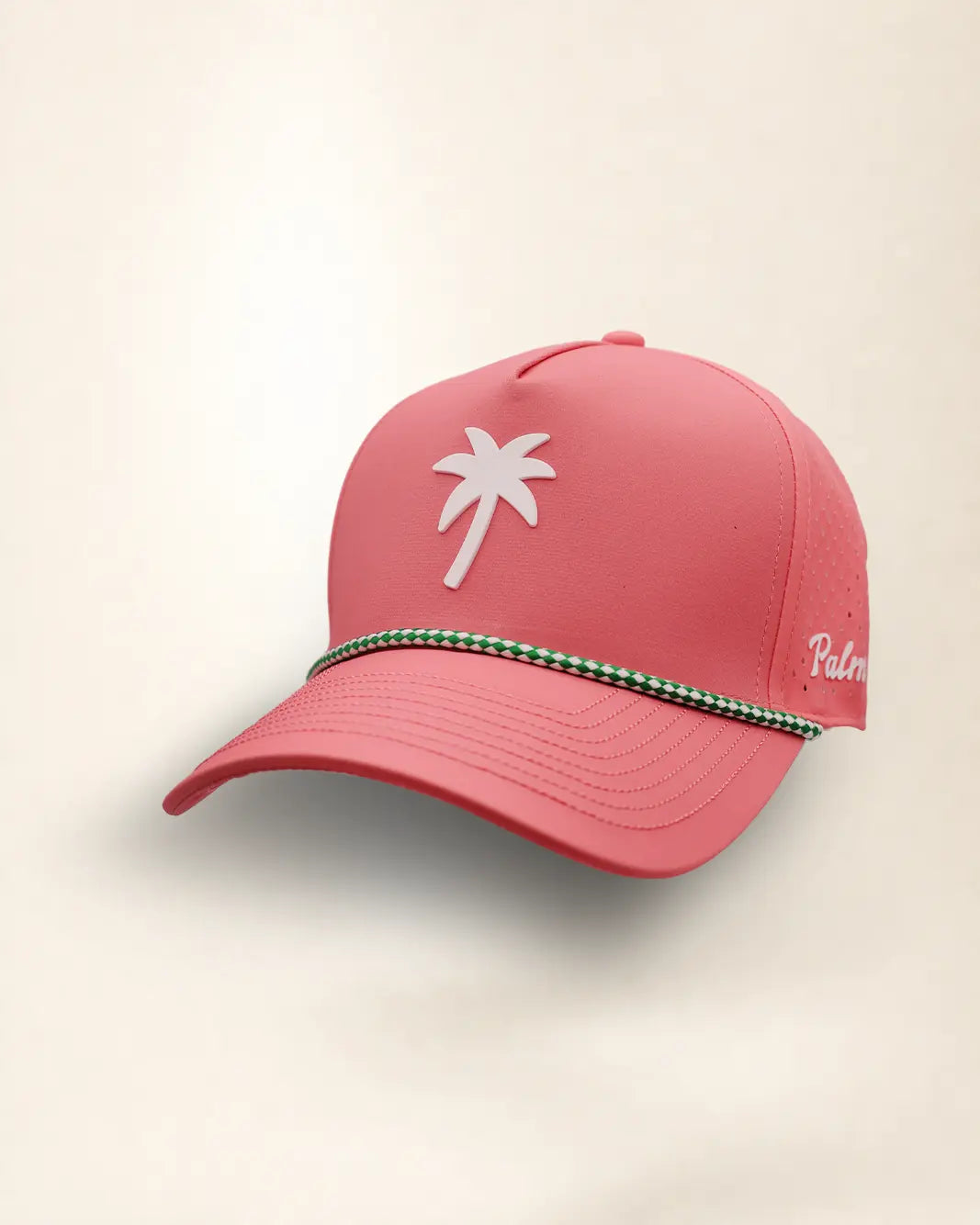 The Palm Icon Signature Hat (Pink), three-quarter view: white raised palm tree icon on a pink rope snapback, green and white rope, white Palmr script.