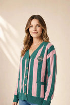The Palm of My Heart Cardigan pink and cream striped cozy knit with front pockets and embroidered patch