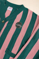 The Palm of My Heart Cardigan in pink and cream stripes with embroidered patch and front pockets, cozy and polished knitwear.
