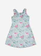 Dress with flamingo and leaf pattern on a white background