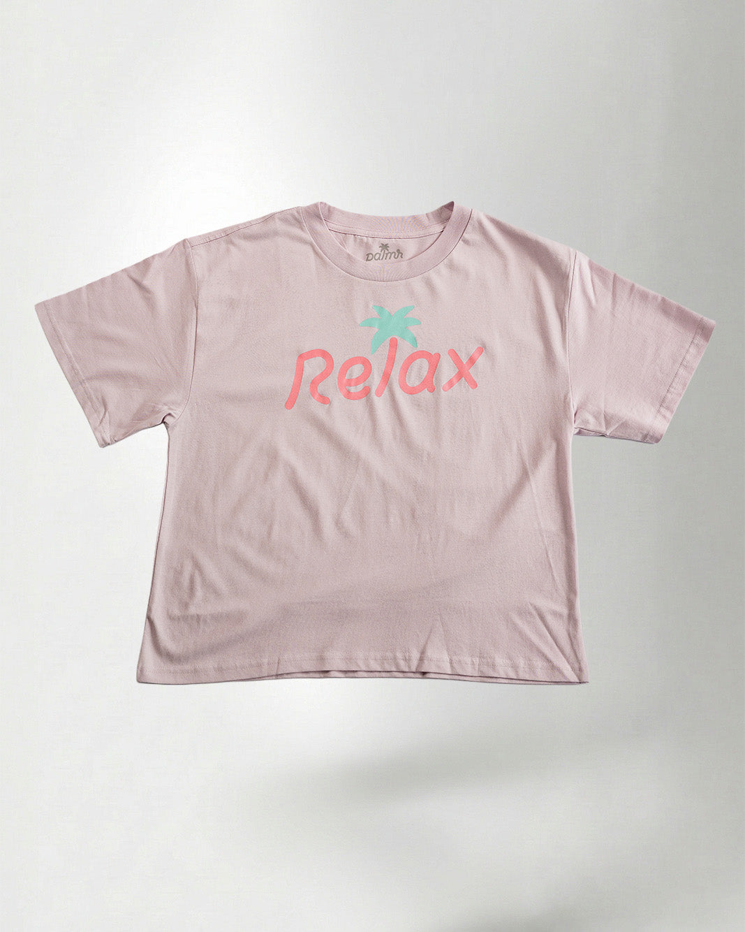 Light pink t-shirt with 'Relax' printed on it against a plain background