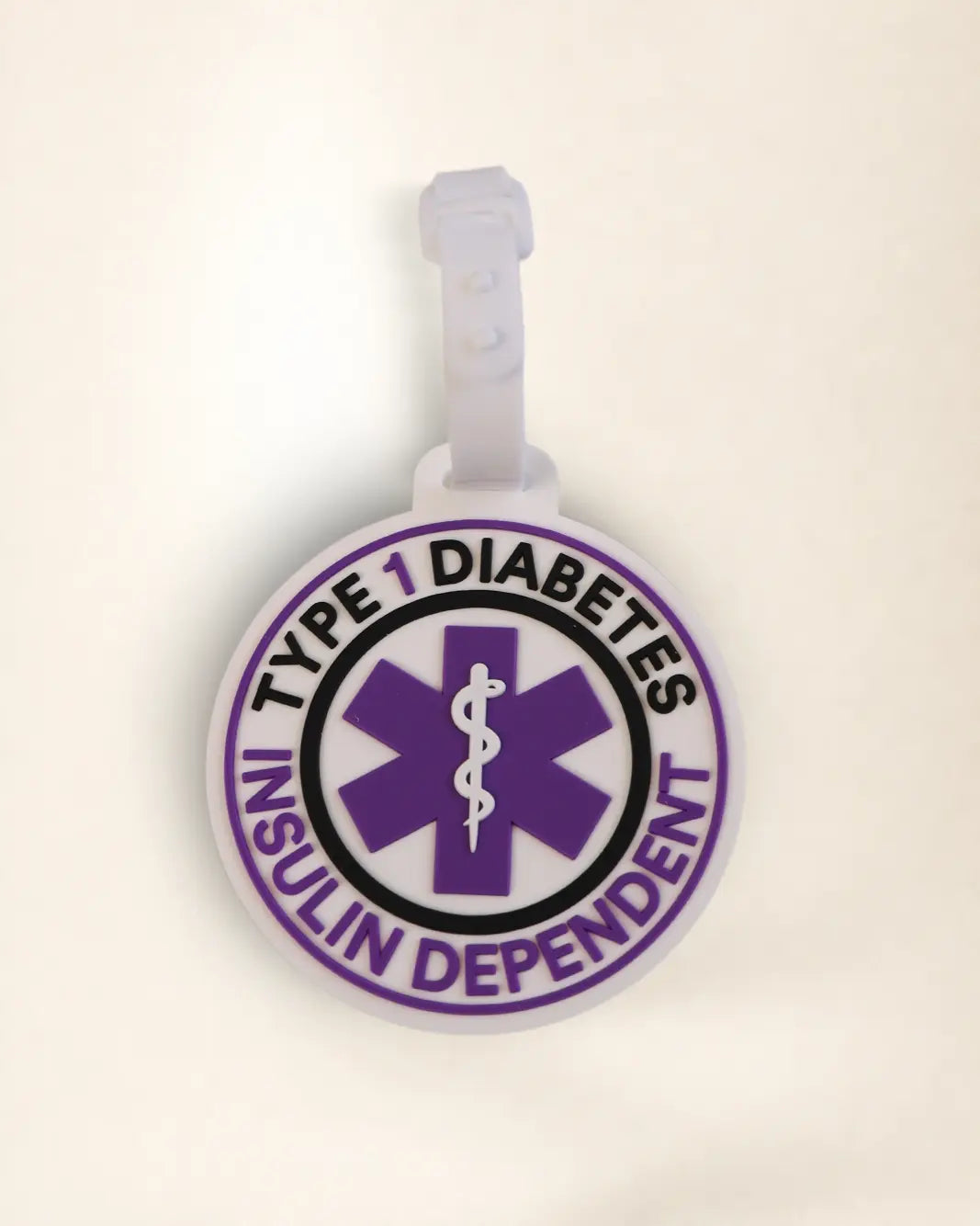 Silicone badge that reads 'Insulin Dependent' and  'Type 1 Diabetes'