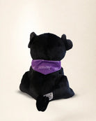 Basal Dog Plush, a black Labrador plush wearing a purple Touched By Type 1 bandana and a Basal name tag