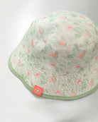 White bucket hat with a color tropical pattern.