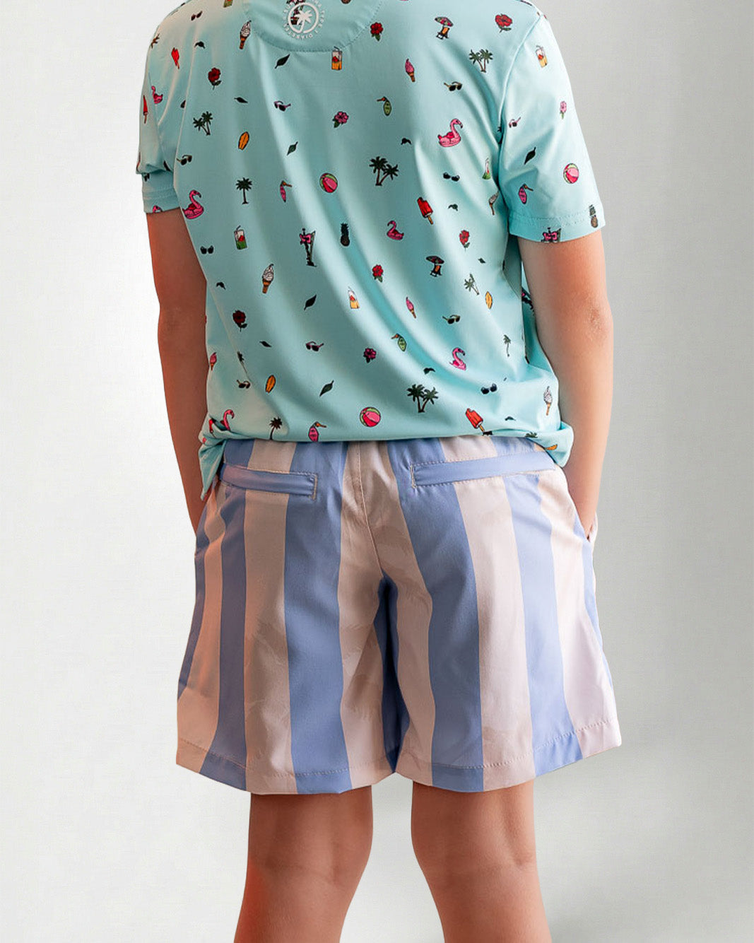 Person wearing striped shorts with "Palmr" embroidery