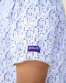 Man wearing a touched a Type One polo shirt