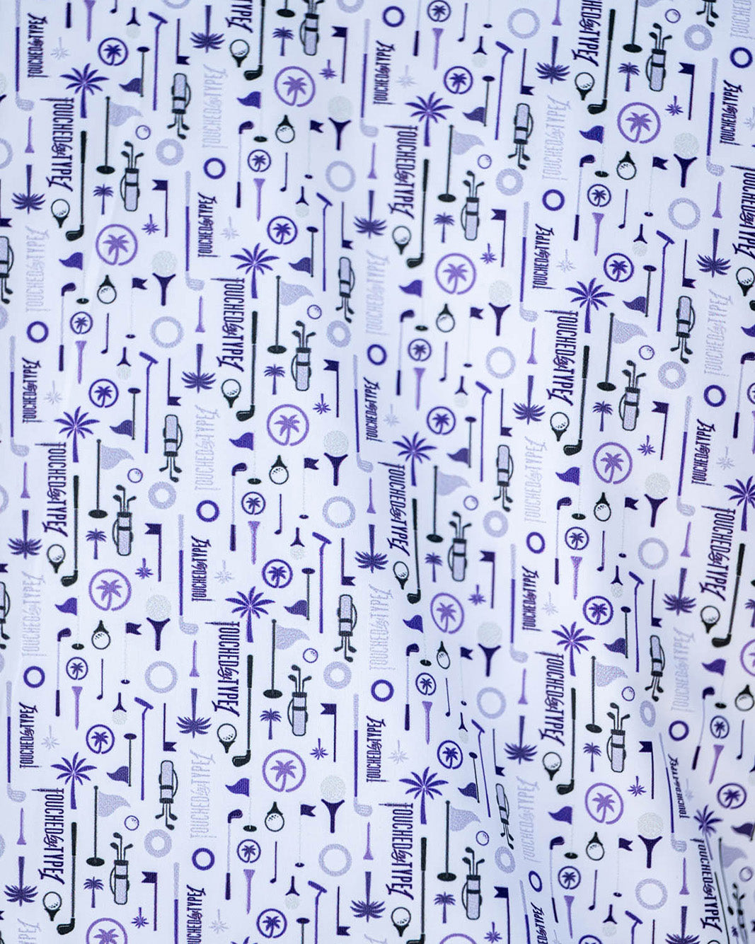 Man wearing a patterned shirt and cap against a plain background