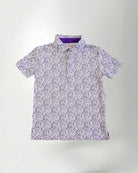 Patterned shirt and blue cap against a plain background