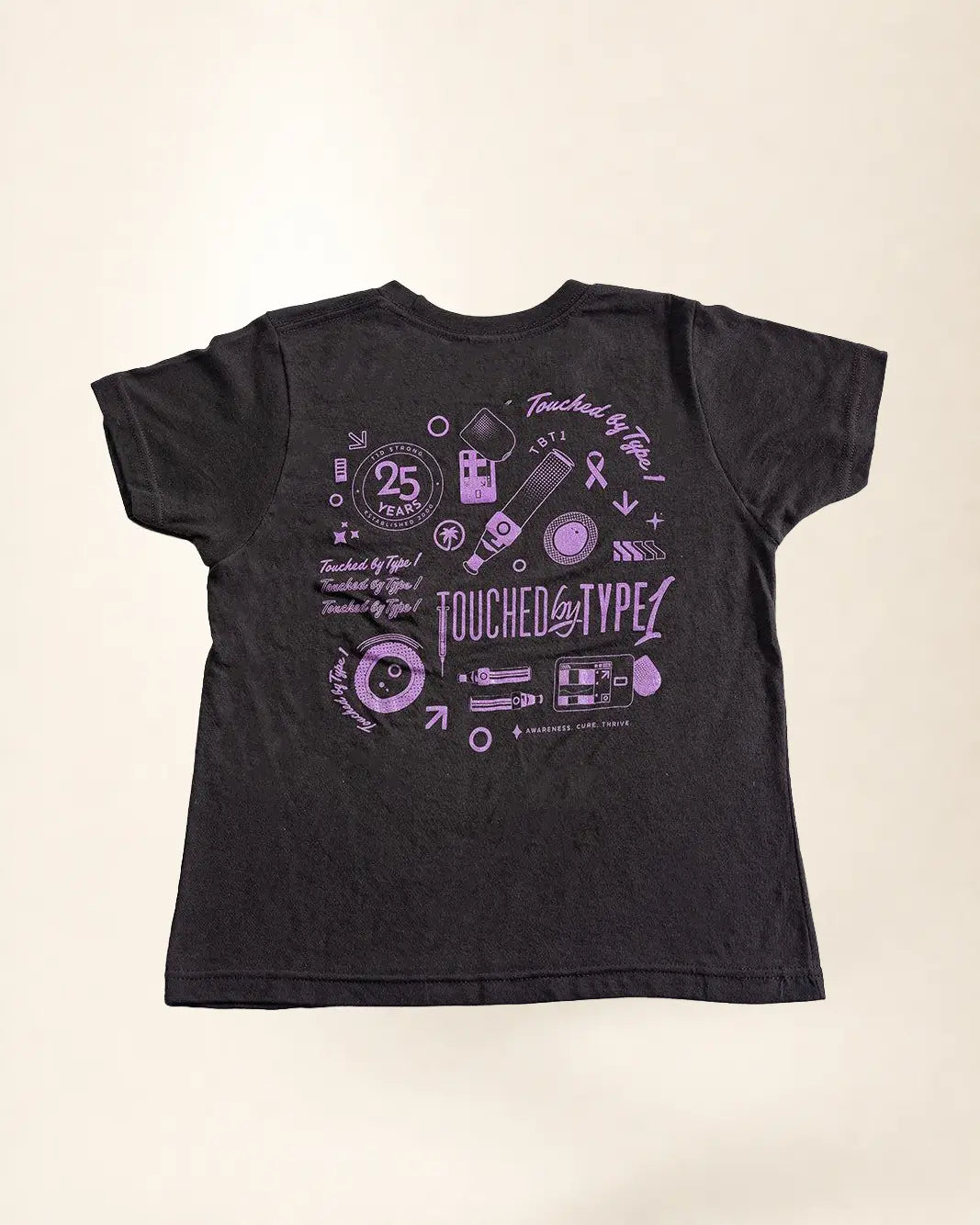 Black t-shirt with purple graphic design on a beige background