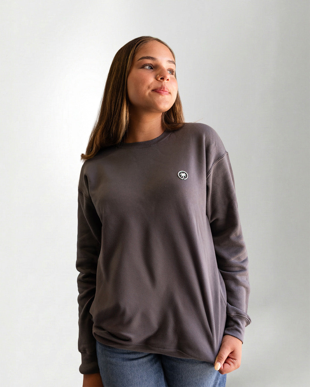 Person wearing a Palmr Style Cloud Embrace Crewneck Sweatshirt against a white background