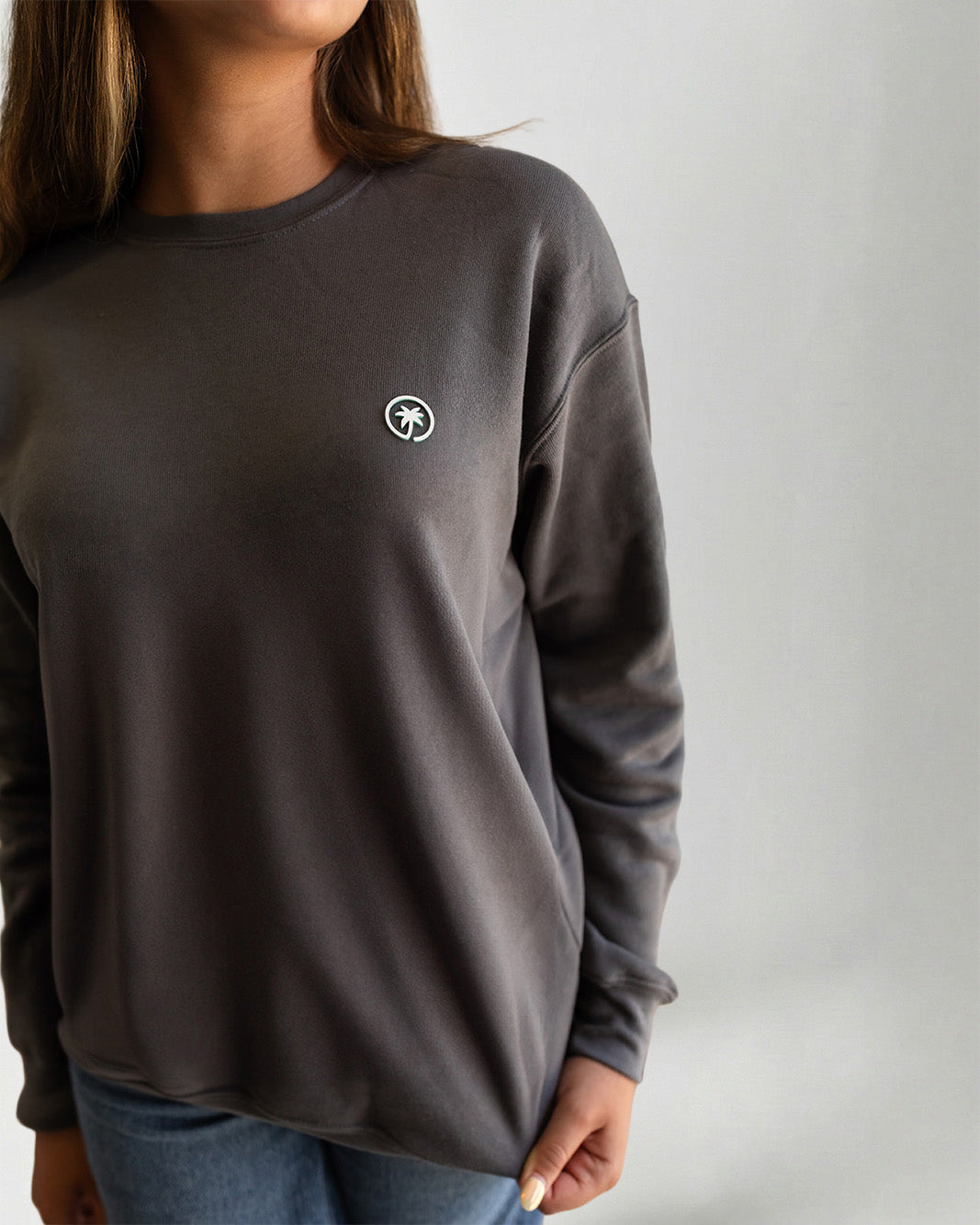 Person wearing a Palmr Style Cloud Embrace Crewneck Sweatshirt against a white background