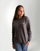 Person wearing a Palmr Style Cloud Embrace Crewneck Sweatshirt against a white background