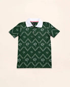 The Club Palm Kids Polo in palm green geometric print with palm tree details and white ribbed collar