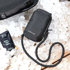Compact insulated crossbody bag with nylon strap, carabiner clips, and chill pack for diabetes medication storage